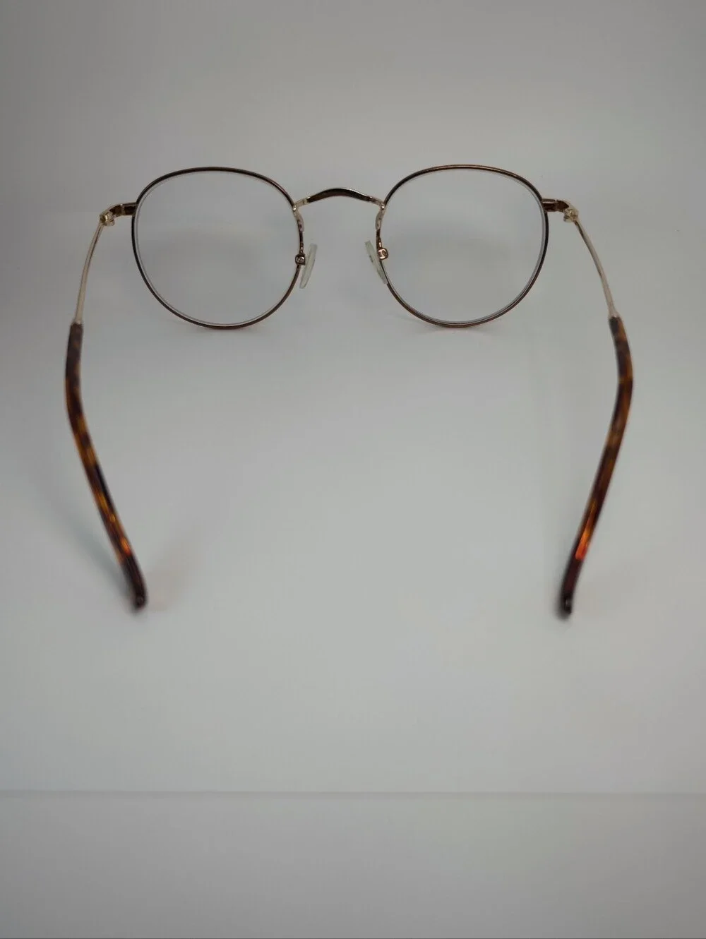 Daydream. Classic Round Metal Frame, Copper Eyewire. Gloss Gold Bridge, Temples.